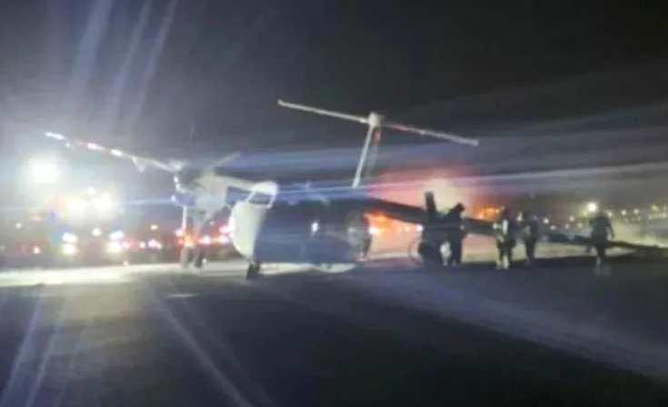 加拿大一客機降落時遇起落架故障 機身起火 加拿大一客機降落時遇起落架故障 機身起火